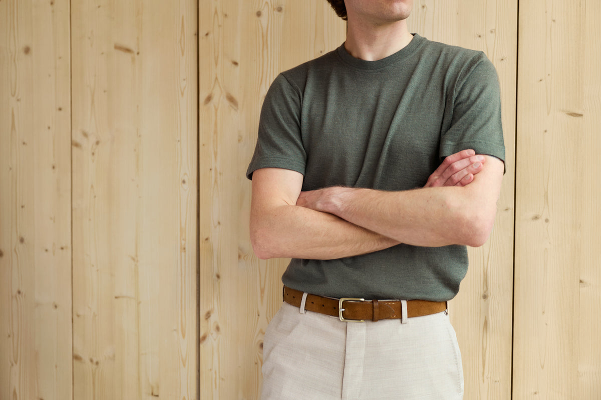 Man wearing a khaki alpaca T-shirt